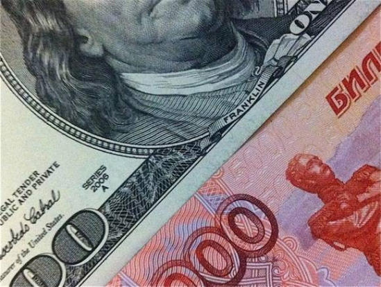 Банк России повысил официальный курс доллара на 32 копейки